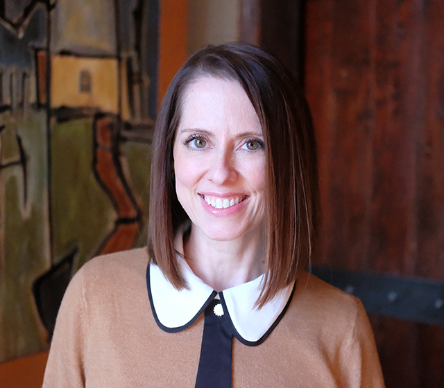 Erin Bartel headshot in Greteman Group office